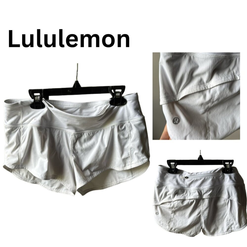 Lululemon sz 6 running shorts | white | back zip pocket with 2 hip pockets |